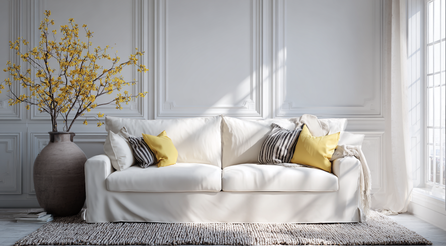 Canapé en simili cuir avec plaid